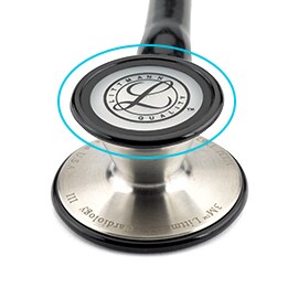 Rond cyan indiquant la membrane ajustable recouvrant la cloche d’un stéthoscope 3M Littmann Cardiology III.